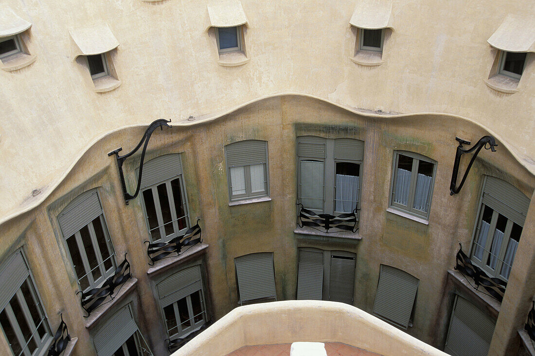 View on the facade of inner courtyard from the rooftop, La Pedrera (Milà House 1906-1912, by Gaudí). Barcelona. Spain