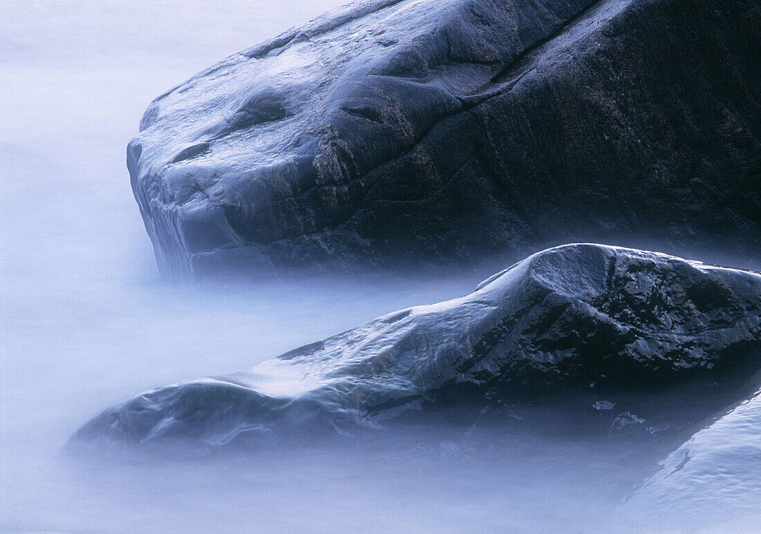 Rocks in waters edge. Kattegatt Sea, Skåne, Sweden, Scandinavia, Europe.