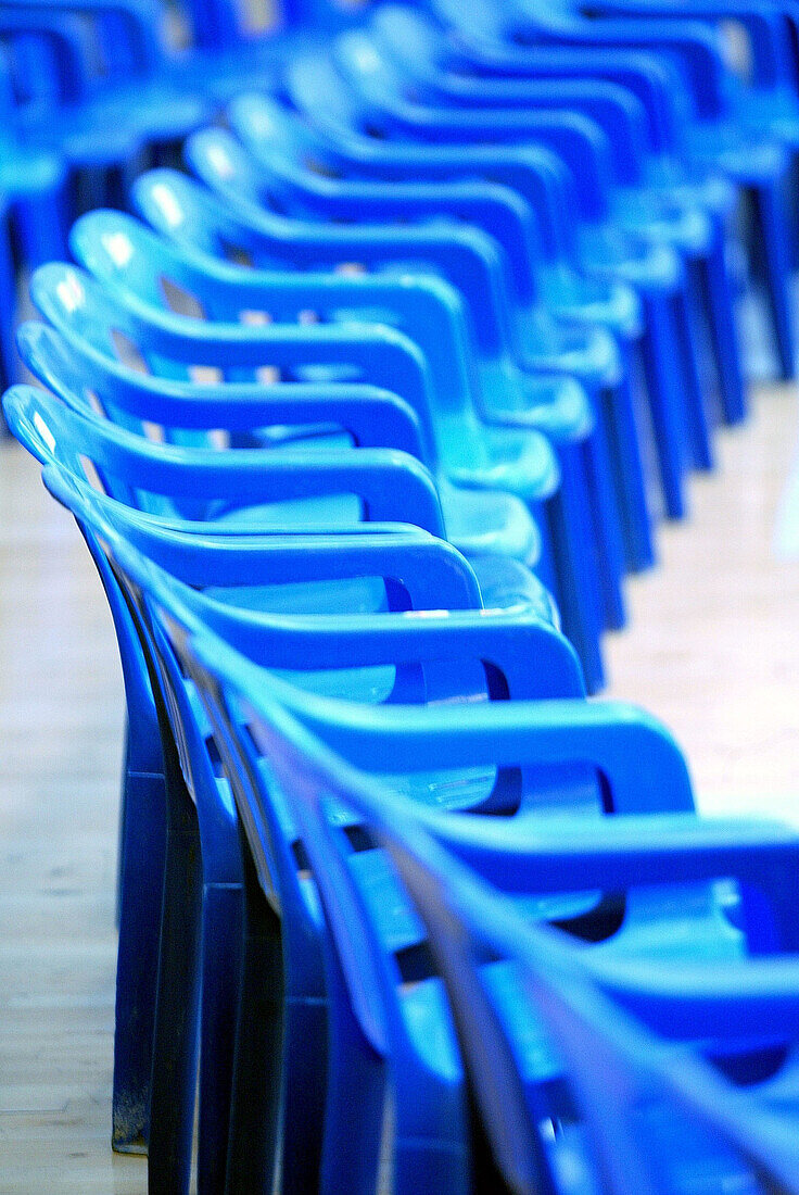  Arrangement, Audience, Blue, Chair, Chairs, Color, Colour, Concept, Concepts, Detail, Details, Empty, Indoor, Indoors, Inside, Interior, Line, Lined up, Lined-up, Lines, Many, Order, Plastic, Ready, Row, Rows, Vertical, G96-216007, agefotostock 