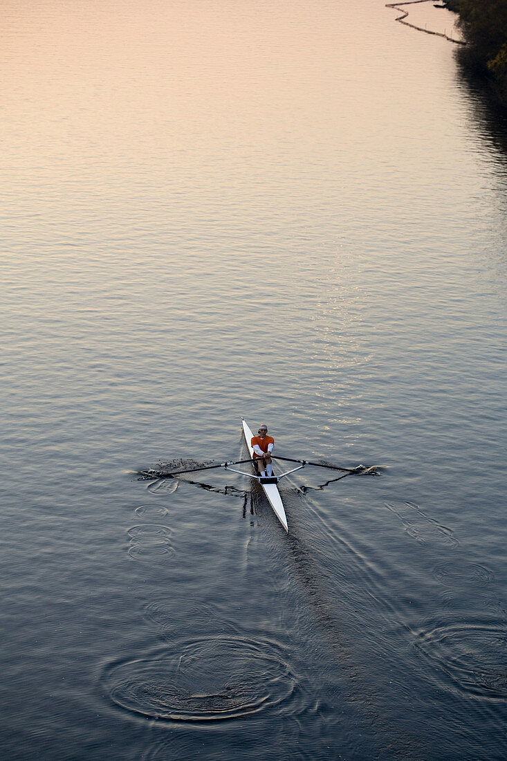 Rowing shell on Charles River, foggy, Boston, Massachusetts. USA