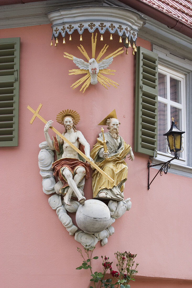 Sculptures at corner. Sulzfeld. Unterfranken, Germany