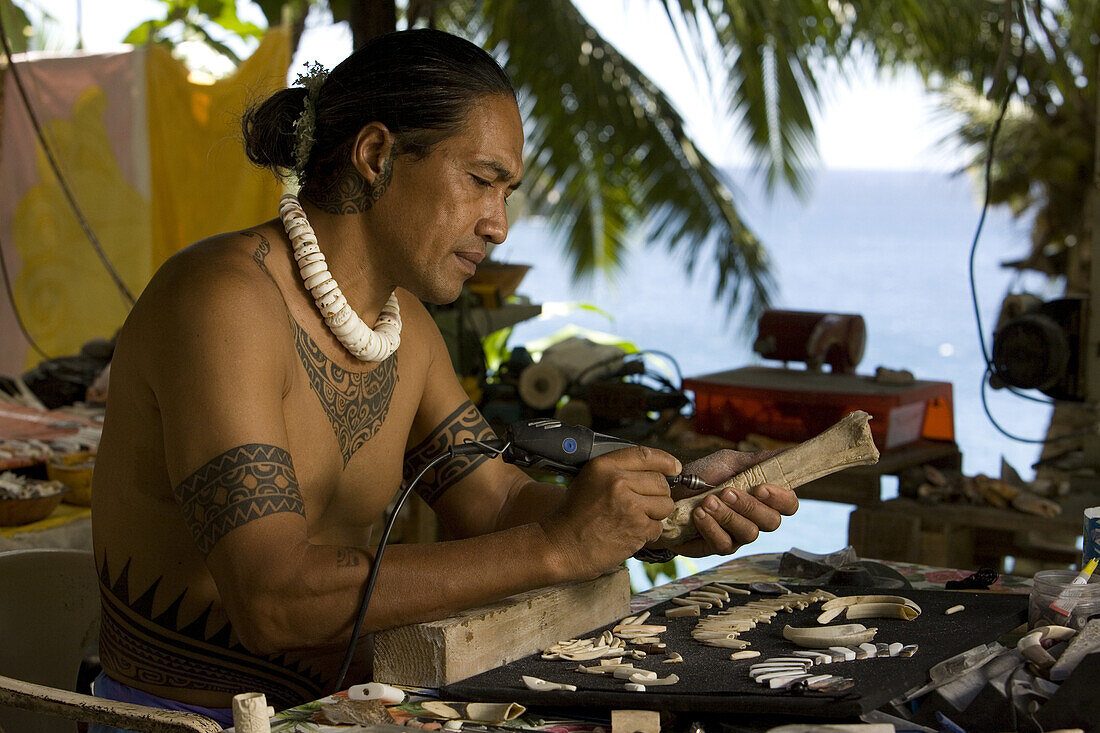 Bone carver at work, Ua Pou, Marquesas, Polynesia, Oceania