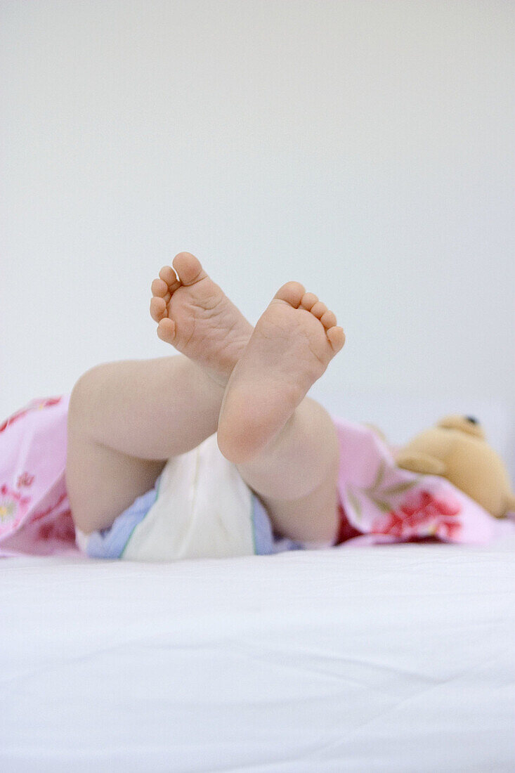 Baby lying with diaper