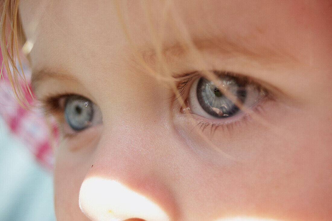 Close-up shot of big blue eyes.
