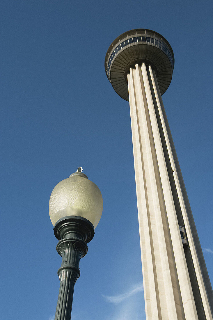 TEXAS San Antonio. Tower of the Americas, Hemisfair Park, street lamp, optical illusion, size contrast