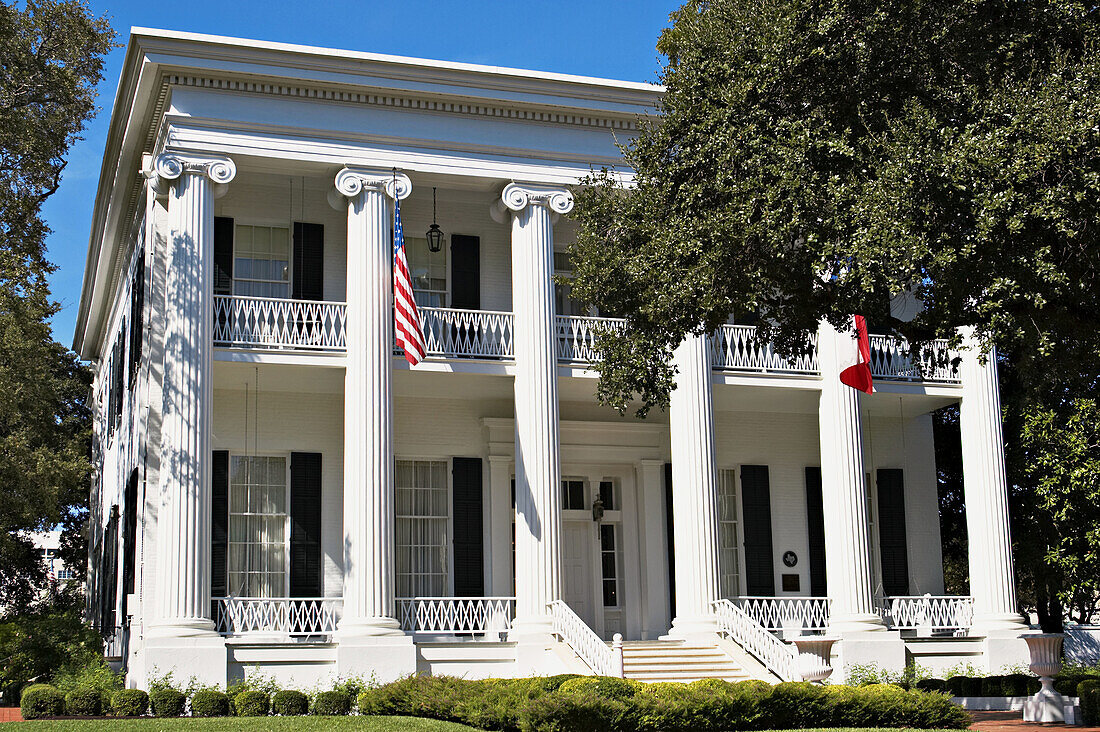 Texas, Austin. Governors Mansion, across street from state capitol building, columns, white building
