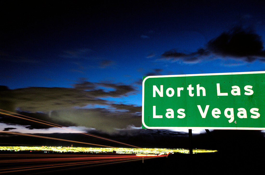 Highway sign for Las Vegas with Las Vegas in background. Nevada. USA.