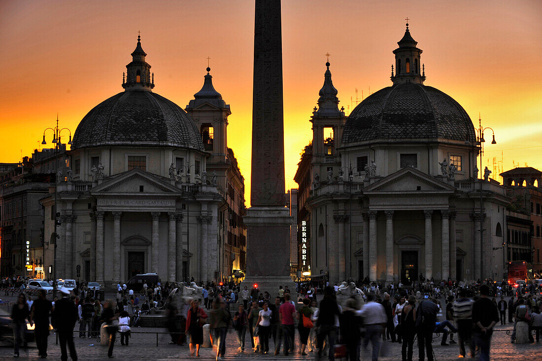 Piazza del Popolo, twin churches Santa Maria dei Miracoli and Santa Maria in Montesanto, and Egyptian obelisk of Ramesses II in the evening light, Rome, Italy