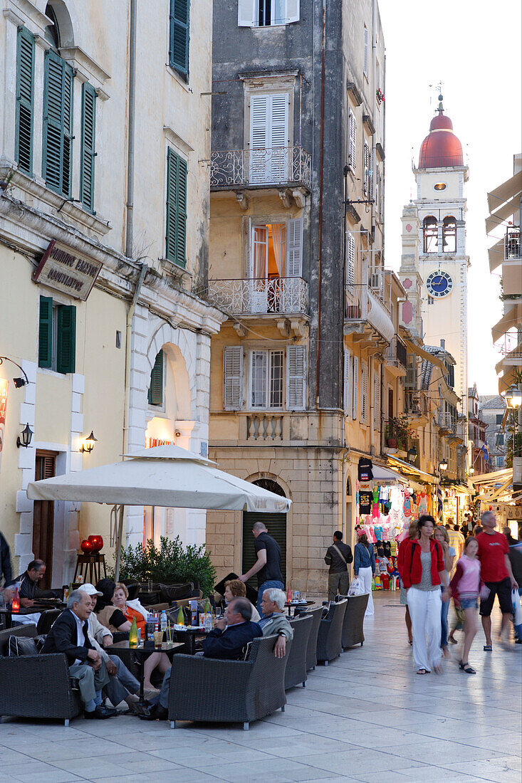 People sitting in cafes in the city in the evening, Corfu, Ionian Islands, Greece