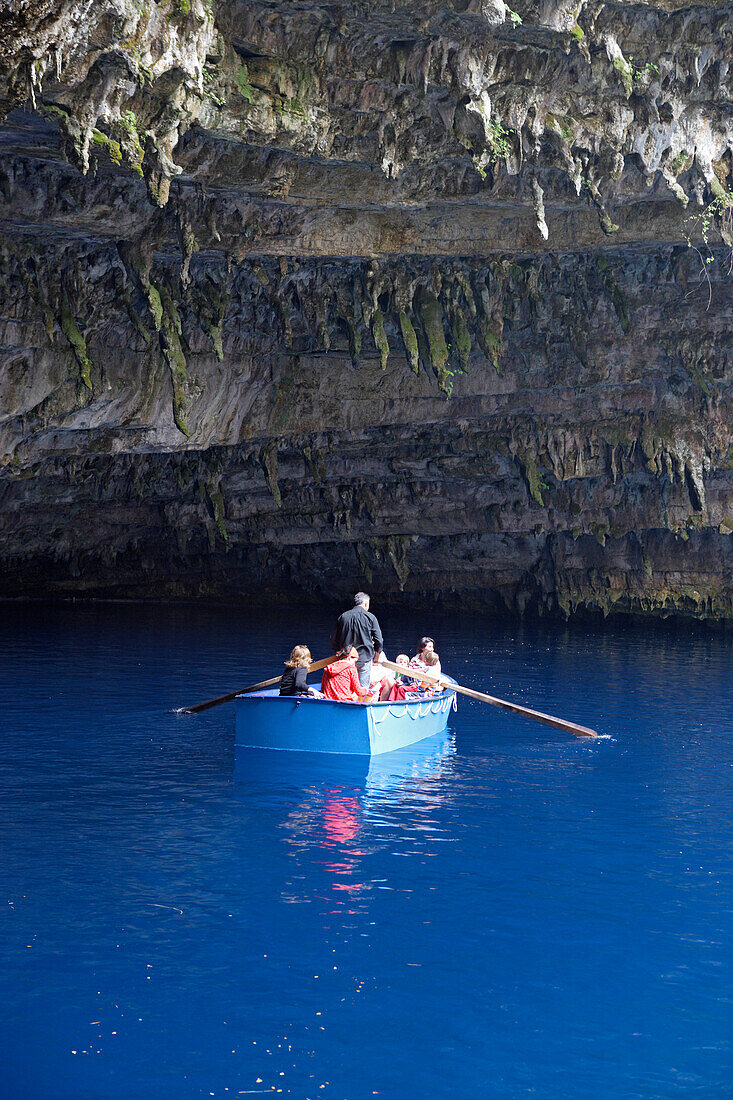 Cephalonia, tourists driving in a boat in front of Melissani cave in Sami, Ionian Islands, Greece