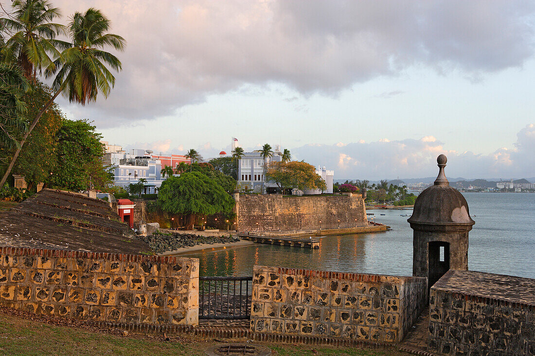 The historic Old Town under cloudy sky, Puerta de San Juan, San Juan, Puerto Rico, Carribean, America