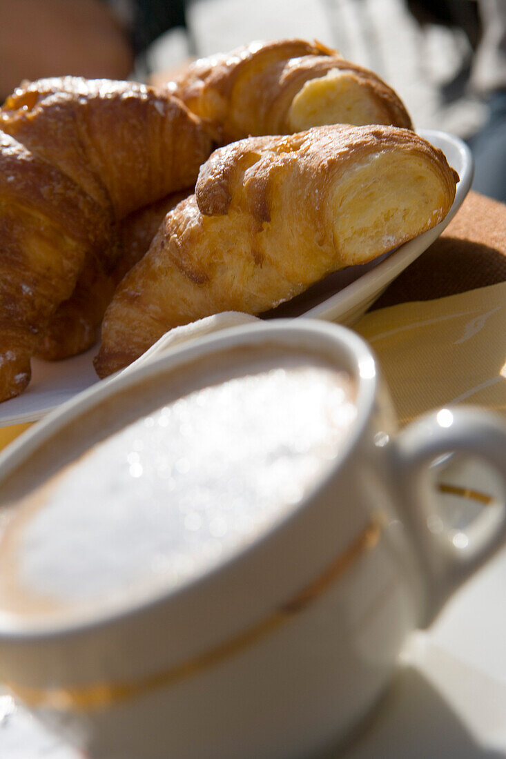 Cappuccino and croissant in a cafe, Dolci, Venice, Veneto, Italy