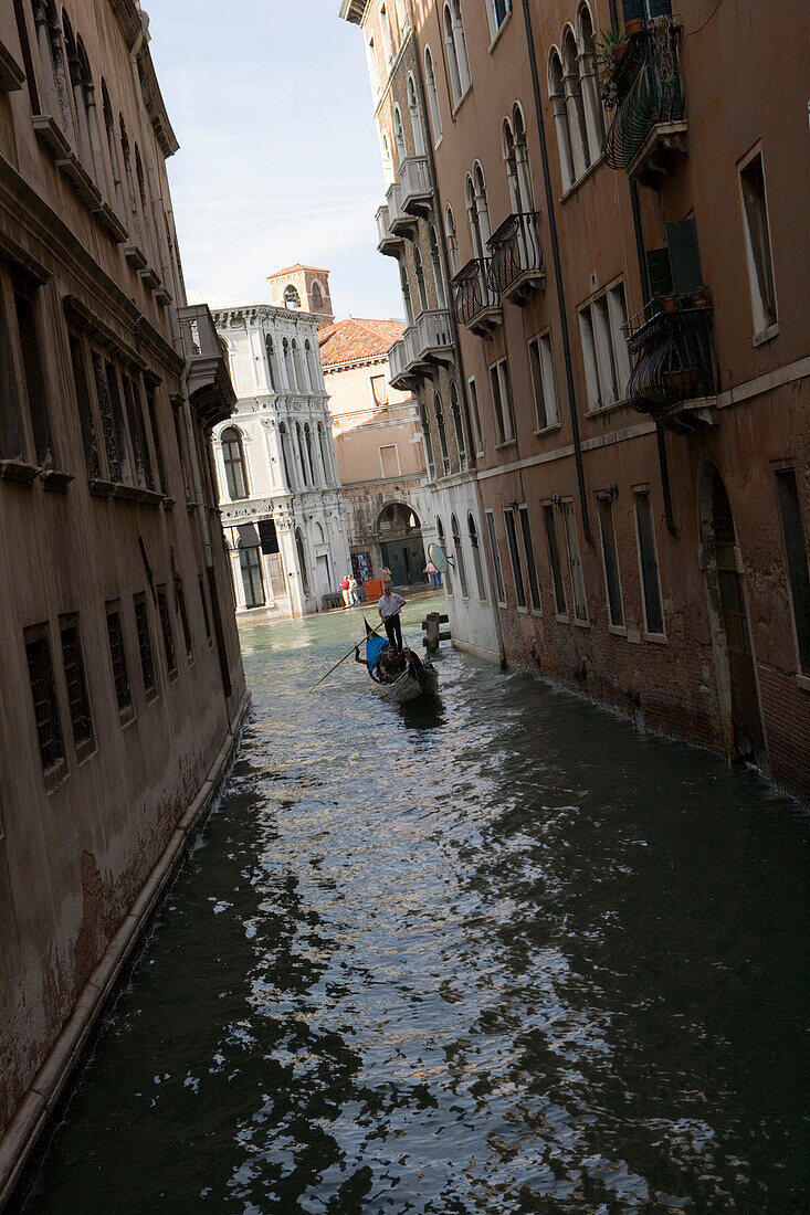 Gondola on a canal, Venice, Veneto, Italy