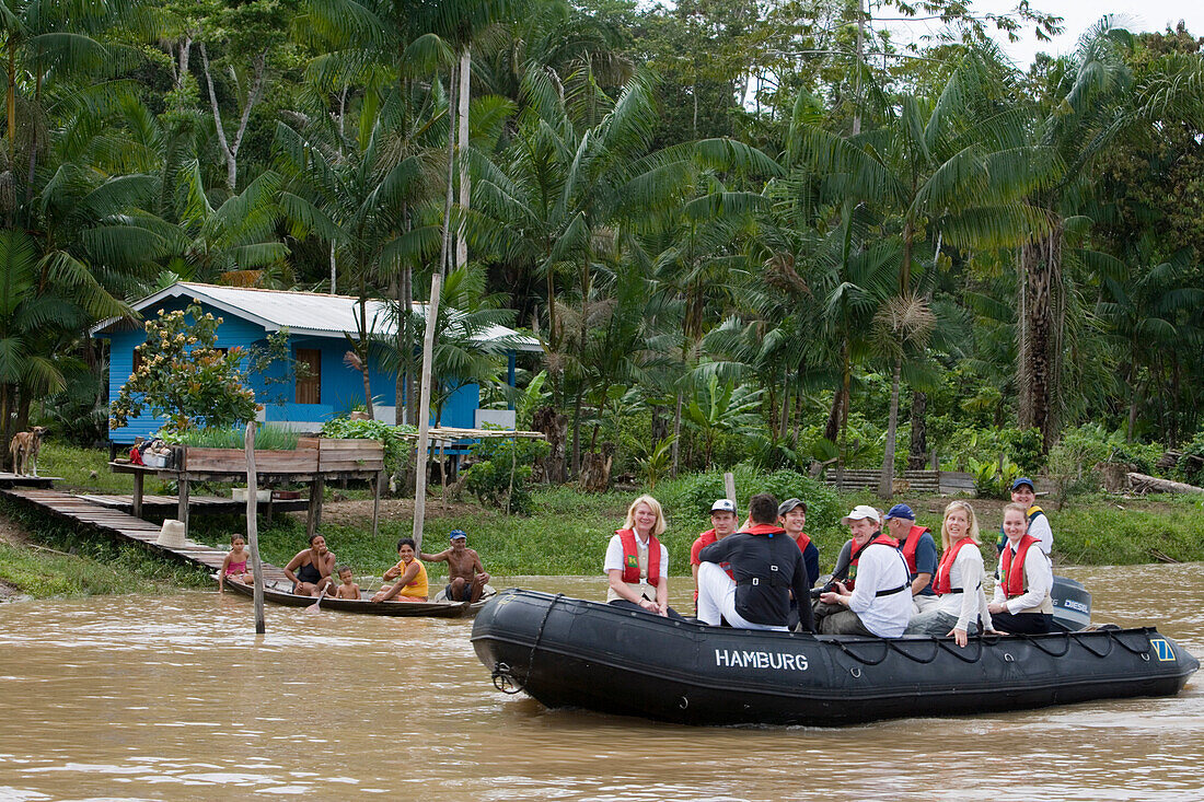 MS Europa Zodiac Expedition, Canoe and house on stilts on the Rio do Cajari, a branch of the Amazon River, Rio do Cajari, Para, Brazil, South America