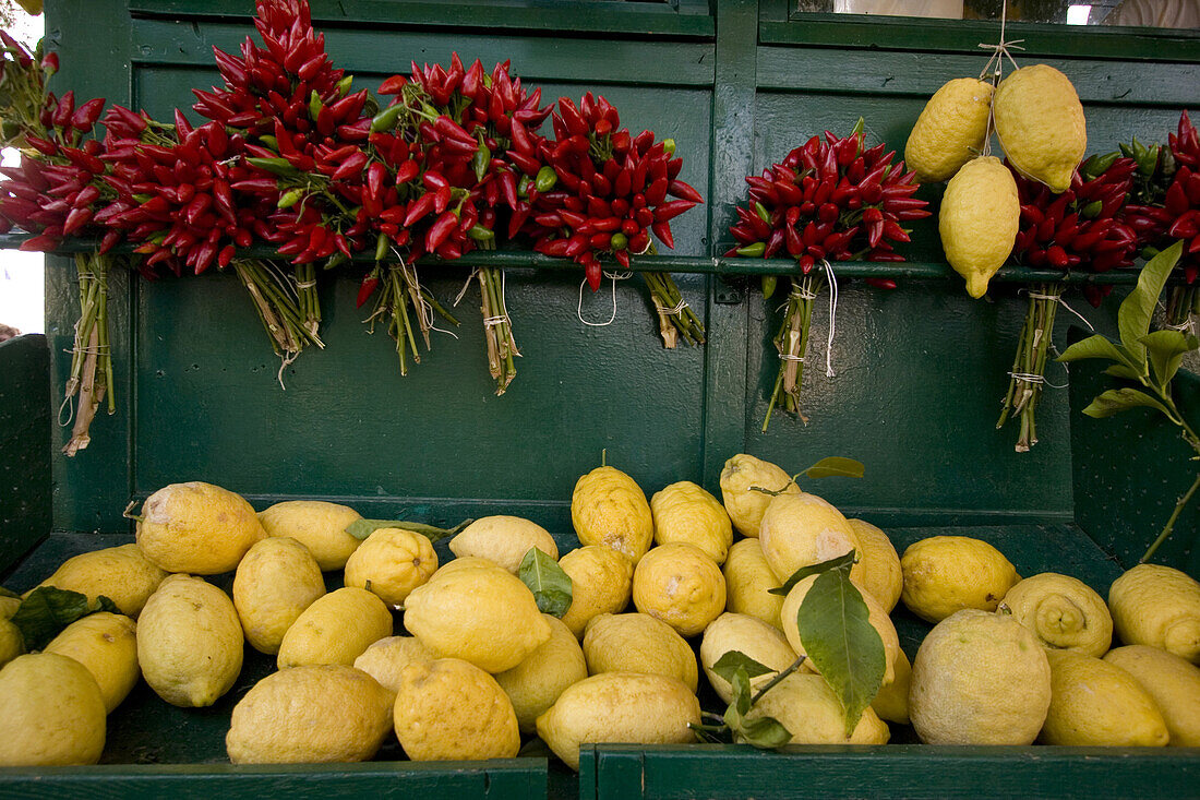 Lemons and chilis at a sales stand, Lake Garda, Italy, Europe