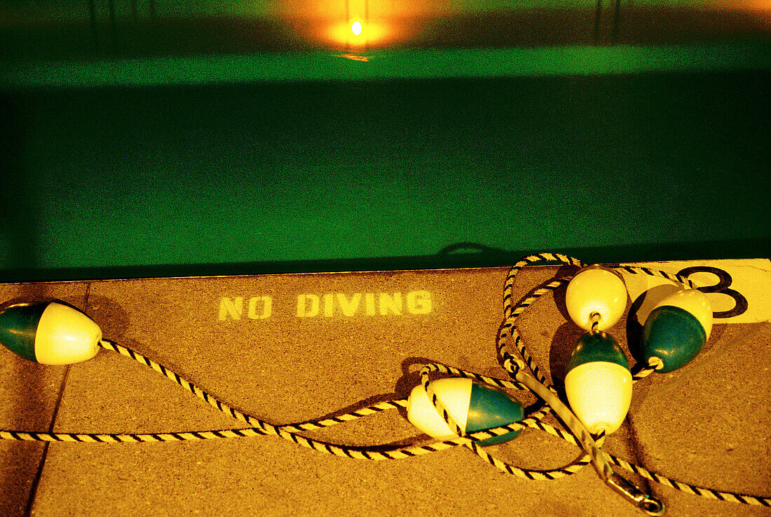  Border, Buoy, Buoys, Color, Colour, Concept, Concepts, Dark, Darkness, Detail, Details, Edge, Forbidden, Horizontal, Illuminated, Illumination, No diving, Prohibited, Prohibition, Rope, Ropes, Safety, Security, Sign, Signs, Swimming pool, Swimming pools,