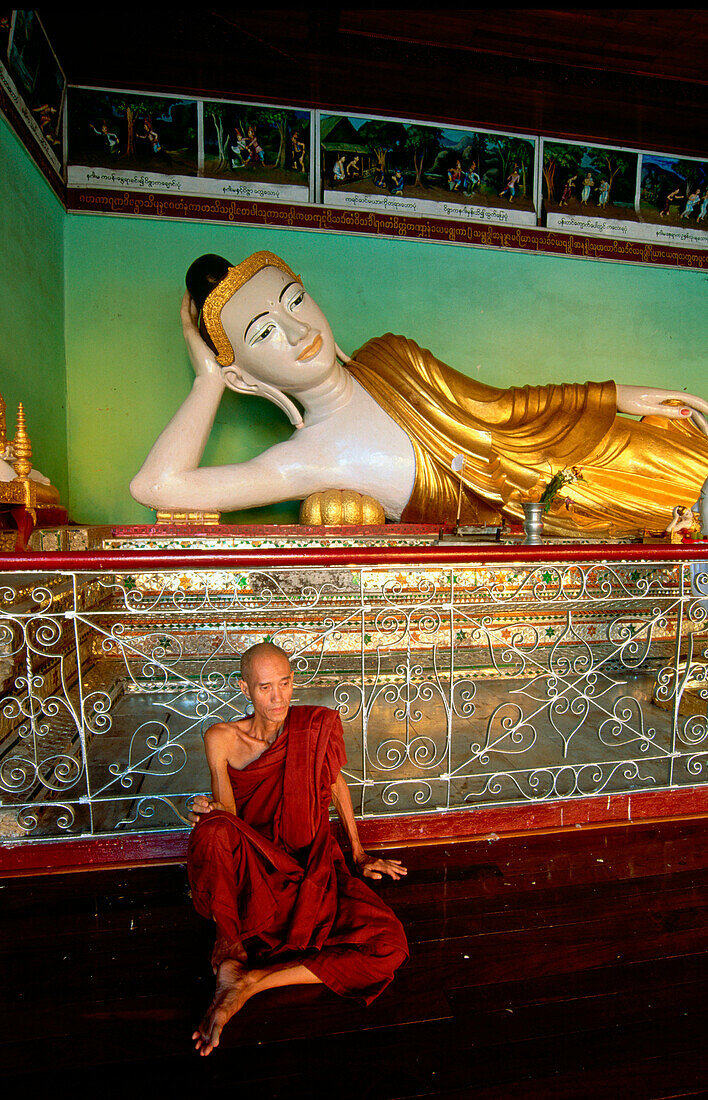 Monk inside the Shwedagon pagoda. Yangon. Myanmar