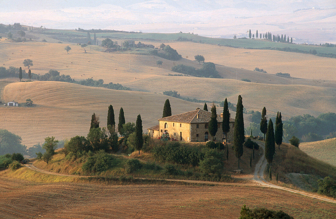 Sunset near San Quirico in Val d Orcia. Siena province. Tuscany, Italy