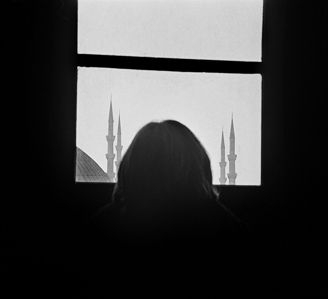  Adult, Adults, Anonymous, Asia, B&W, Back view, Back-light, Backlight, Black-and-White, Building, Buildings, Cities, City, Daytime, Europe, Female, Half-light, Horizontal, Human, Indoor, Indoors, Inside, Interior, Istanbul, Minaret, Minarets, Mosque, Mos
