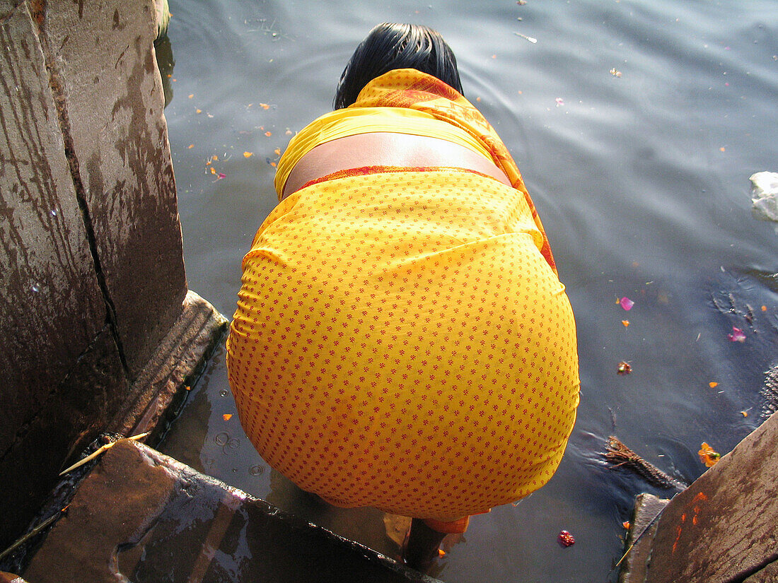 Woman in the Ganges river. Varanasi (Banaras), Uttar Pradesh. India