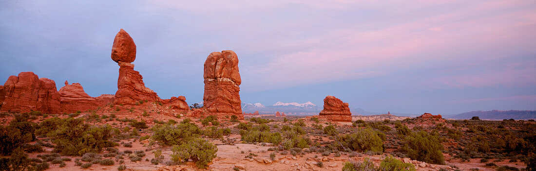 Balanced Rock and La Sal Mountains at the background. Arches National Park. Utah. USA