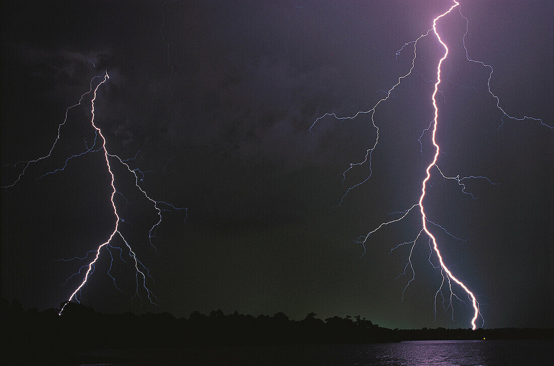 Dual lightning bolt striking over Orlando, Florida