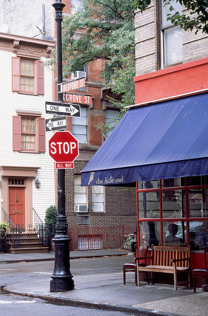 Street signs in front of restaurant The Little Owl, Manhattan, New York, USA, America