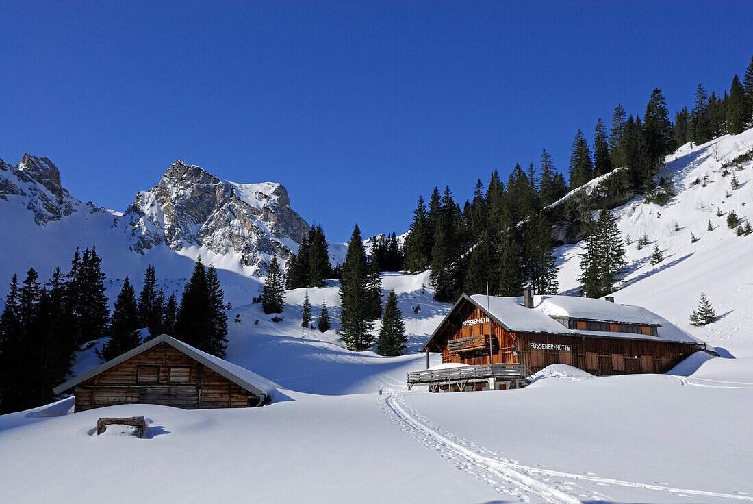 deeply snow-covered hut Füssener Hütte, Tannheim range, Allgaeu range, Allgaeu, Tyrol, Austria