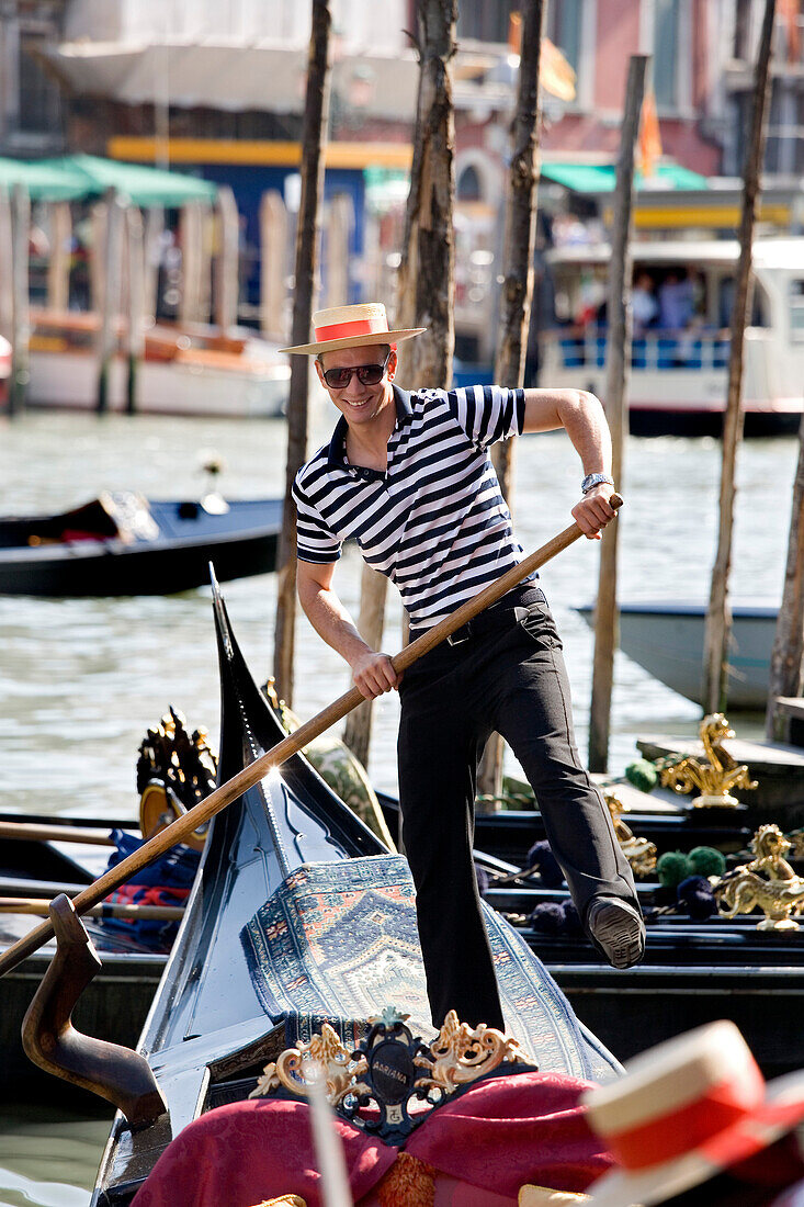 Gondolier, Venice, Veneto, Italy