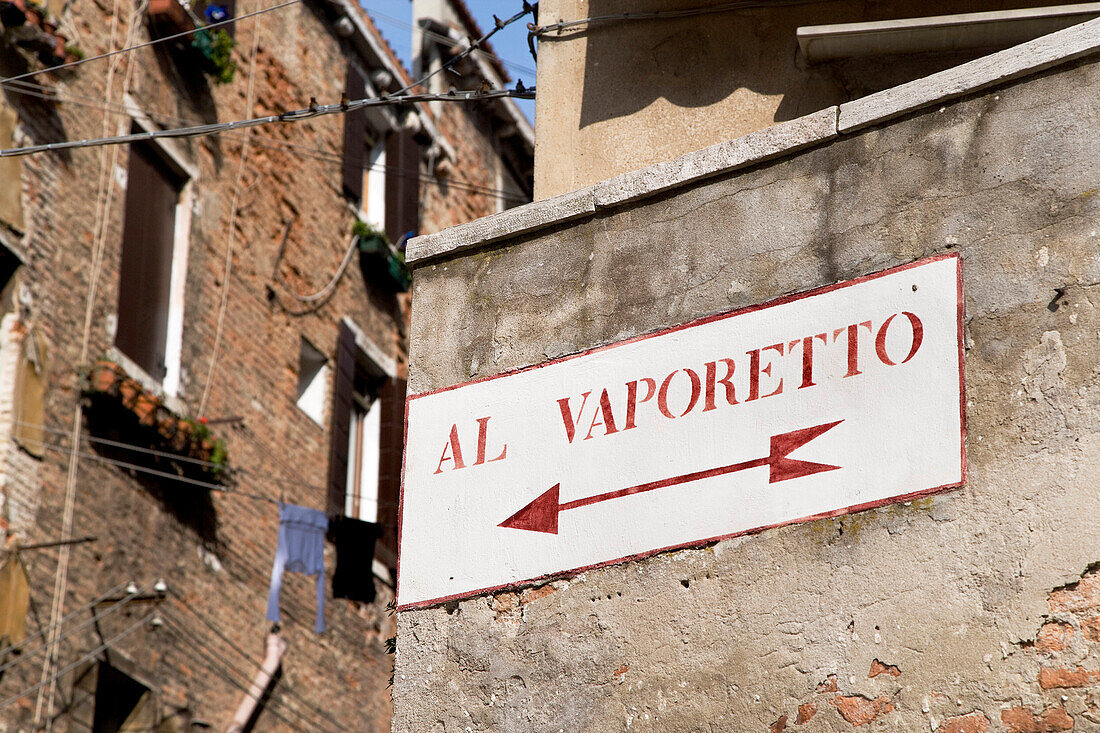 Sign showing direction to Vaporetto, Venice, Veneto, Italy