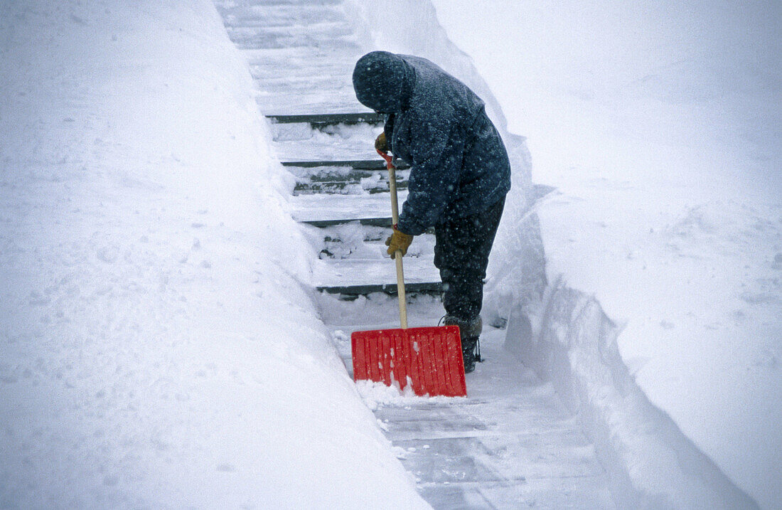 Shovel snow. Pocono region. Pennsylvania. USA