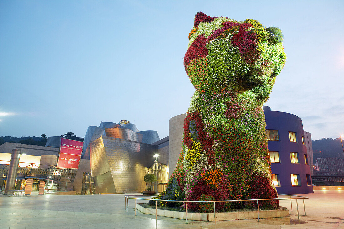 Guggenheim Museum by Frank O. Gehry with Puppy , sculpture by Jeff Koons, at fore. Bilbao. Biscay, Spain