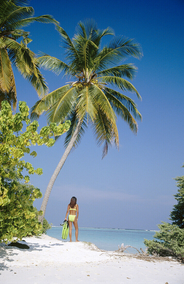 Girl on the beach. Meerufenfushi Island. North Male Atoll. Maldives