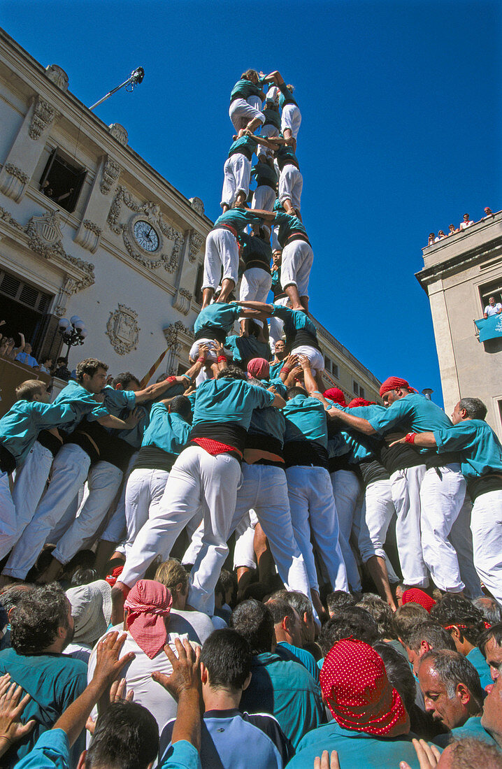 Castellers building human towers, a Catalan tradition. Vilafranca del Penedès. Barcelona province, Spain