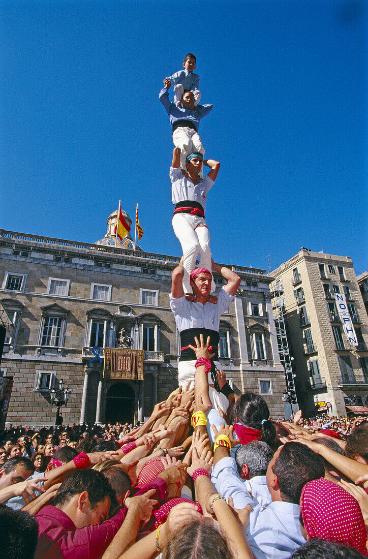 Castellers building human towers, a Catalan tradition. Barcelona. Spain