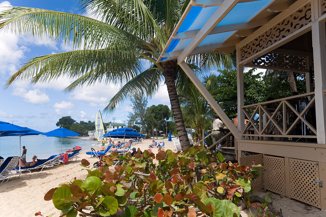 People relaxing at beach, Mullins Bay, Speightstown, Barbados, Caribbean