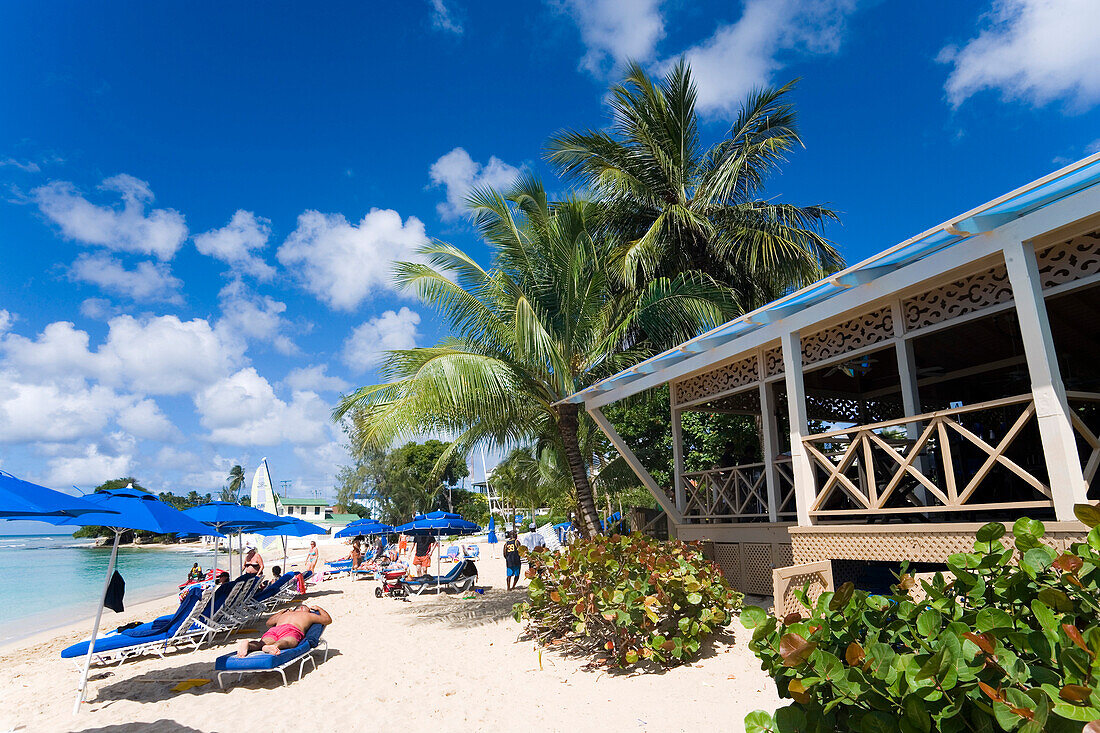 People relaxing at beach, Mullins Bay, Speightstown, Barbados, Caribbean