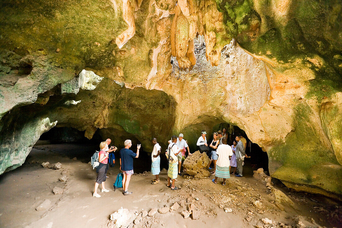 Group of tourists visiting a cave, peninsula Shimoni, Coast, Kenya