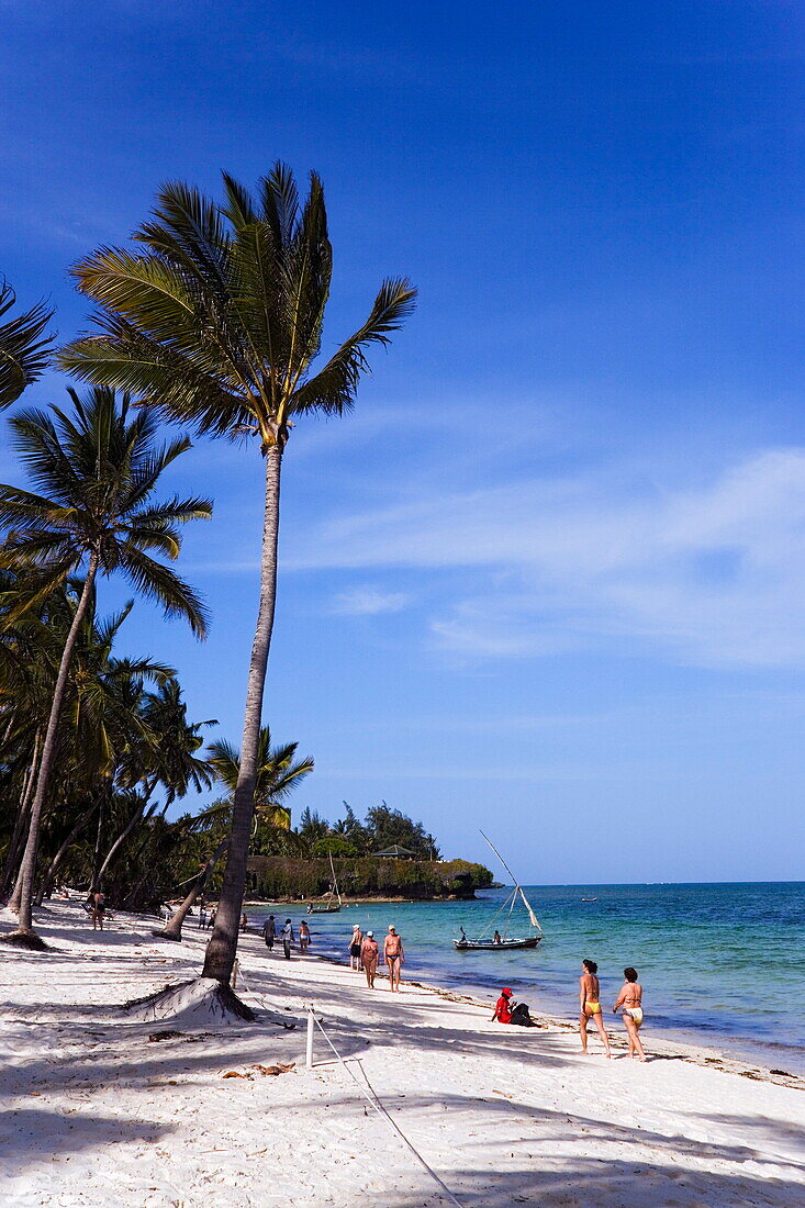 Tourists relaxing at Shanzu Beach, Coast, Kenya