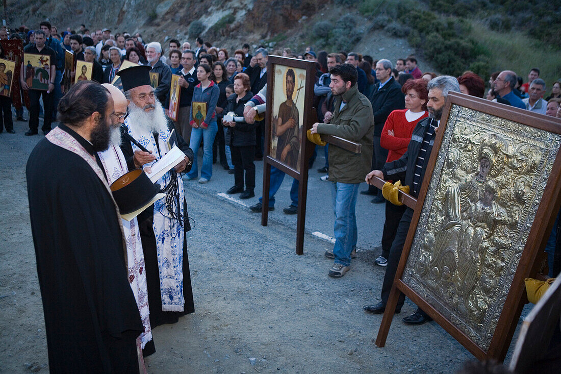 Priests at an icon procession, People holding icons, Orthodox icon procession, Agros, Troodos mountains, South Cyprus, Cyprus