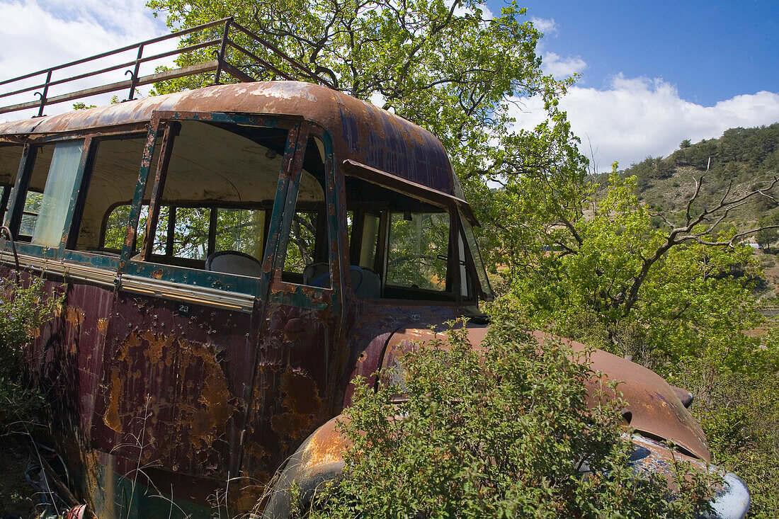 Wreck of a bus, derelict bus, Potamitissa, Pitsilia region, Troodos mountains, South Cyprus, Cyprus