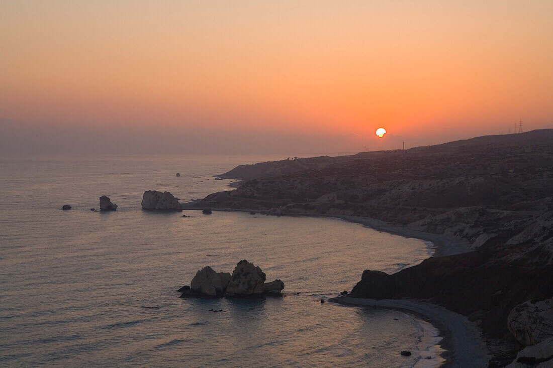 Petra tou Romiou at sunset, Rock of Aphrodite, Aphrodite's birthplace, Symbol, the Rock from which Aphrodite mythically arose from the sea, Limassol, South Cyprus, Cyprus