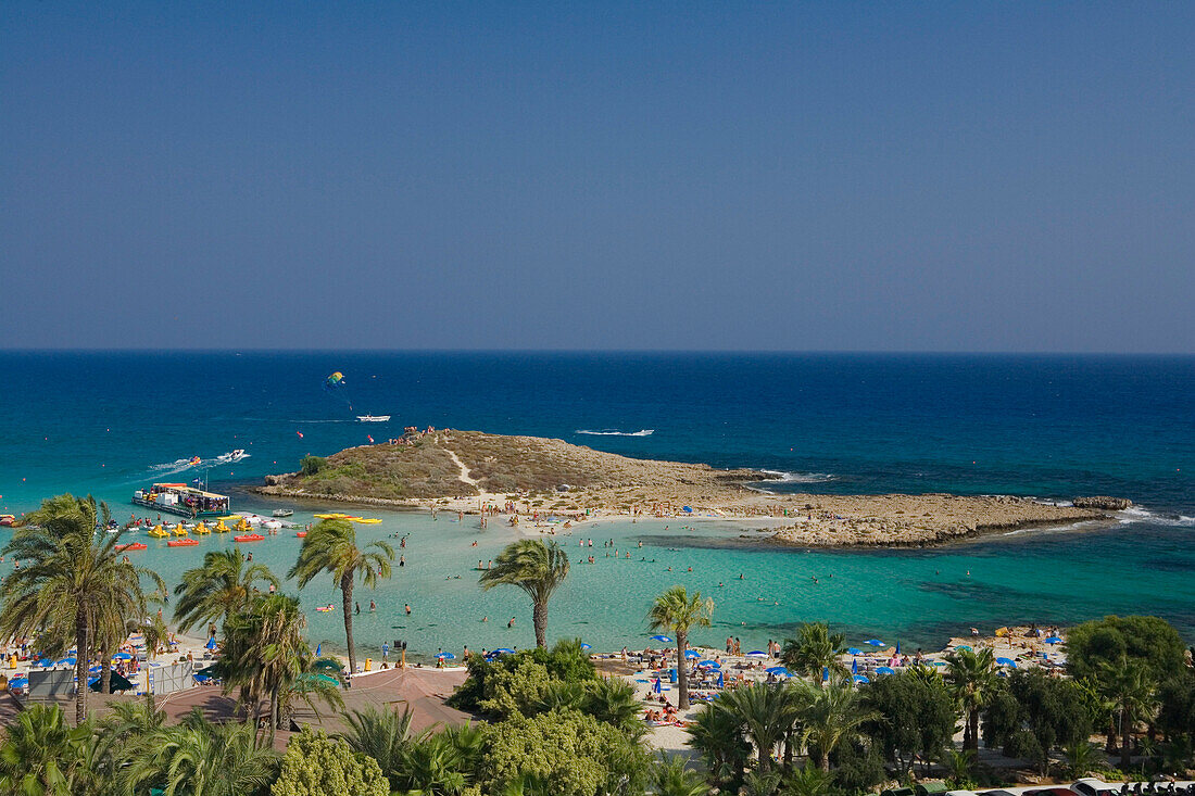 View of Nissi beach with palm trees, Agia Napa, South Cyprus, Cyprus