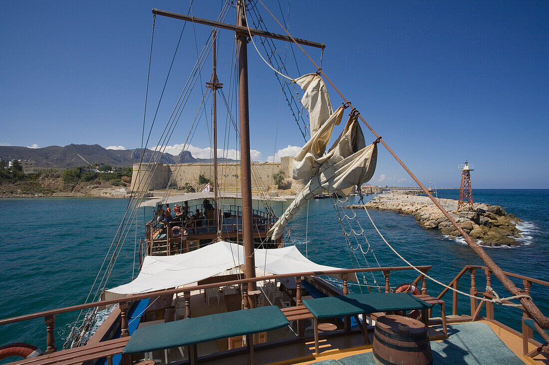 Neptun Pirate boat trip, by Kaleidoskop Turizm, and coast, castle in the background, Kyrenia, Girne, Cyprus