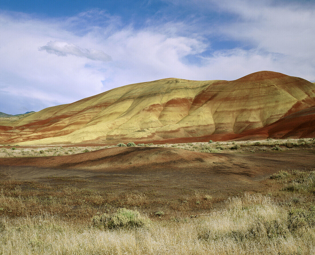 Storm clouds form over Painted Hills. John Day Fossil Beds National Monument. Oregon. USA
