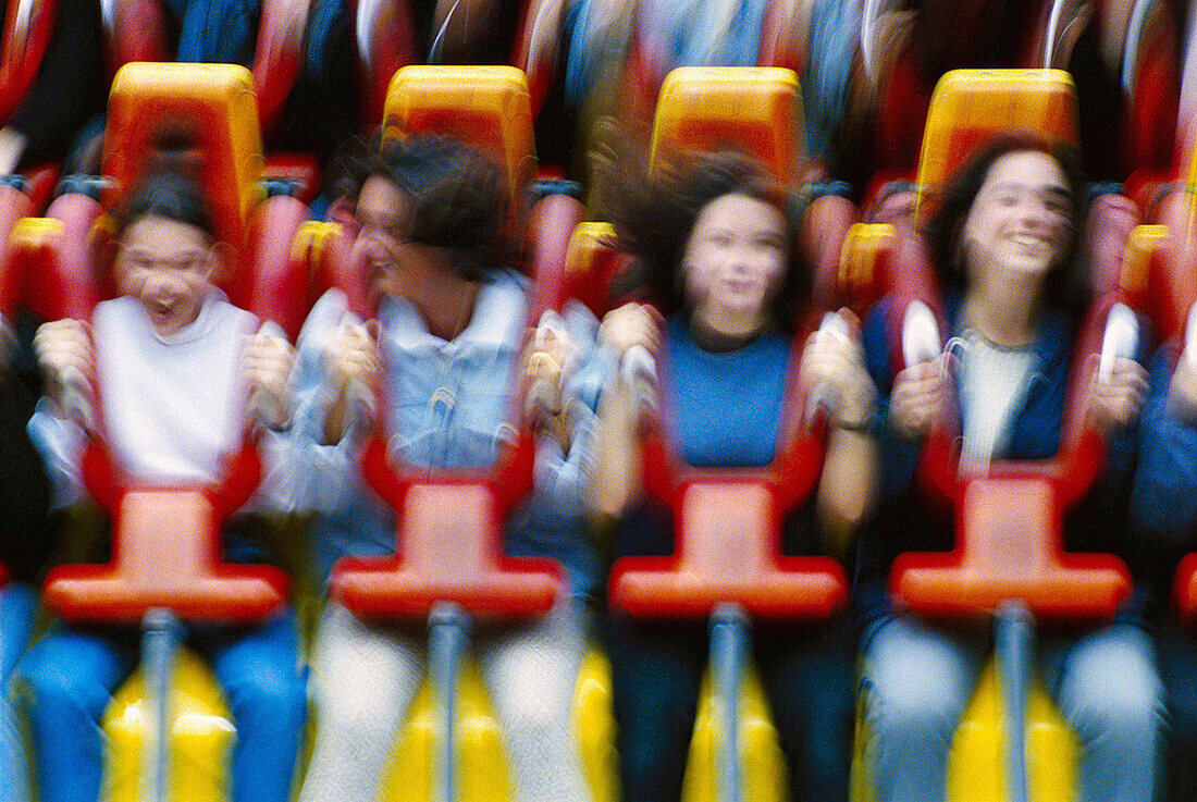  Action, Adult, Adults, Amusement, Amusement park, Amusement parks, Amusements, Blurred, Color, Colour, Contemporary, Danger, Daytime, Emotion, Emotions, Exciting, Exterior, Fair, Fairground, Fairs, Fast, Female, Fun, Funfair, Funfairs, Girl, Girls, Group