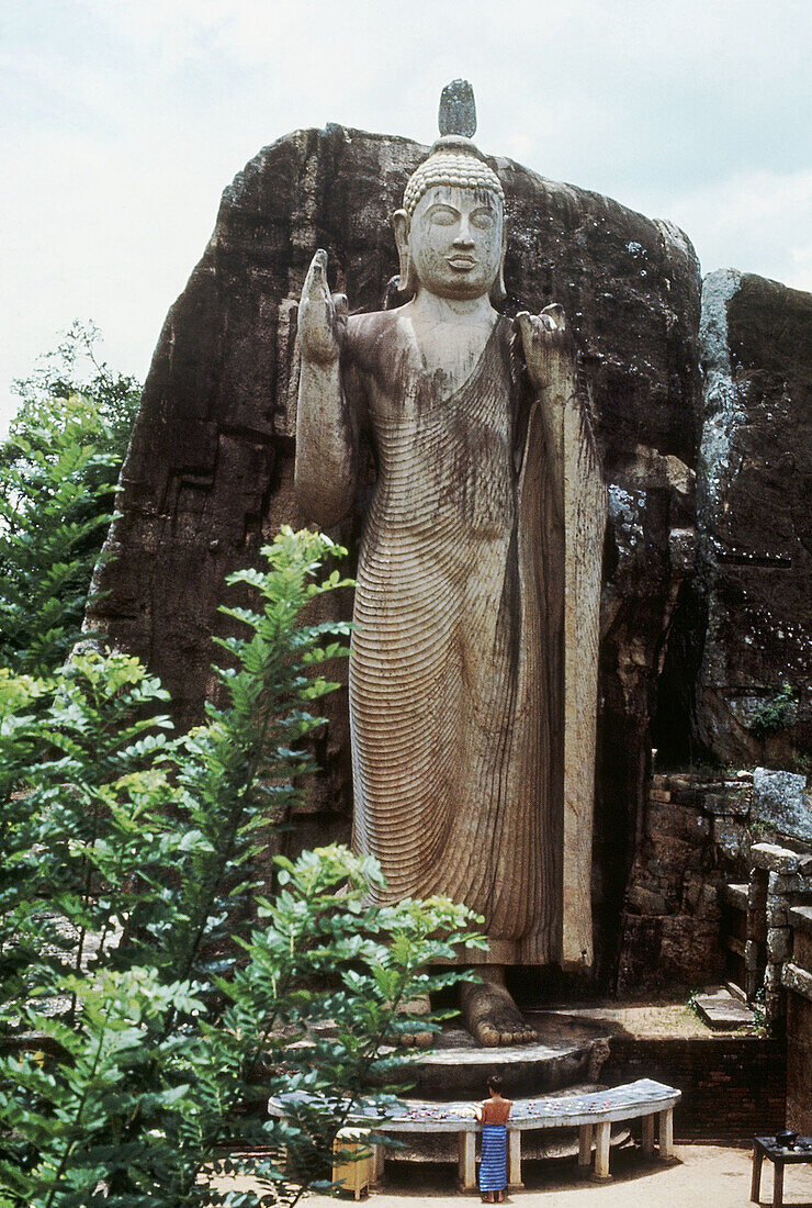 Ancient architecture. Standing Buddha. Dated: 500 A.D. Aukana, Sri Lanka.