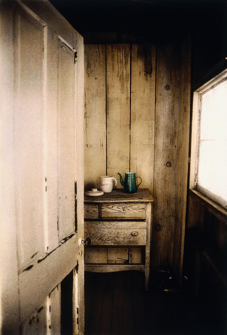 Dishes on dresser in ghost town home