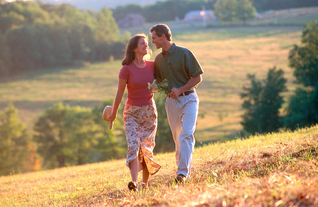 Couple strolling arm in arm