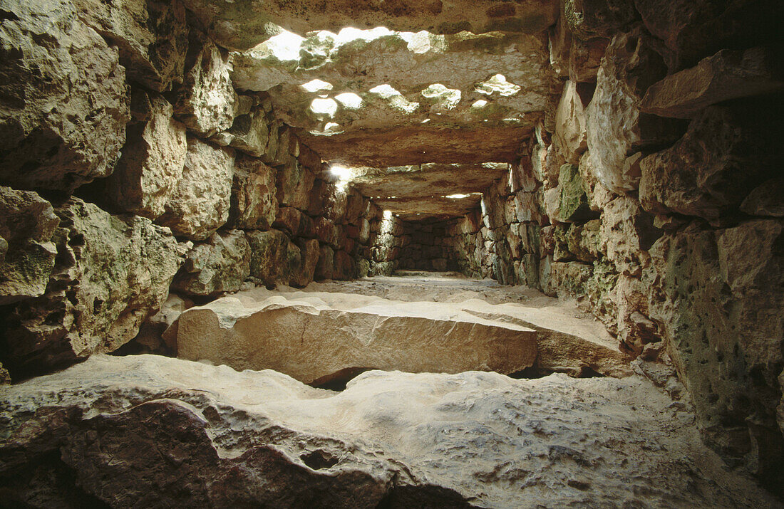 Interior of Naveta des Tudons , prehistoric monument from the Talayotic culture. Ciutadella. Minorca, Baelaric Islands. Spain